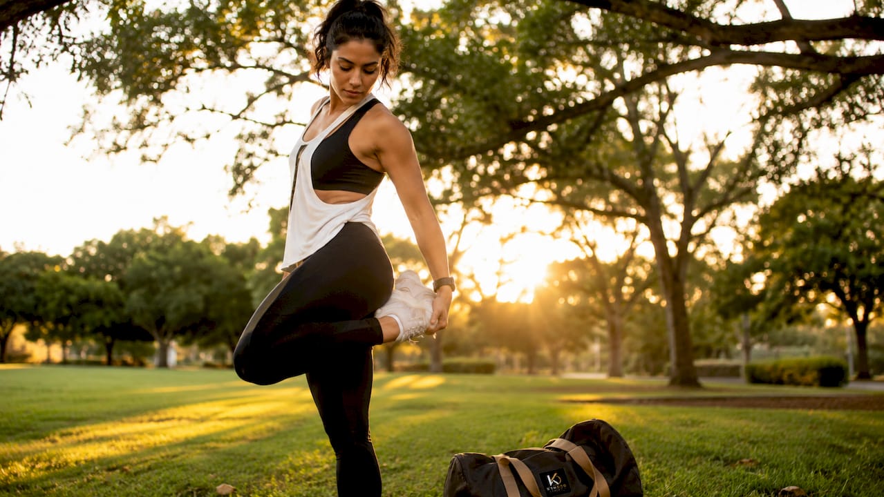 Woman feeling stretch of activewear fabric