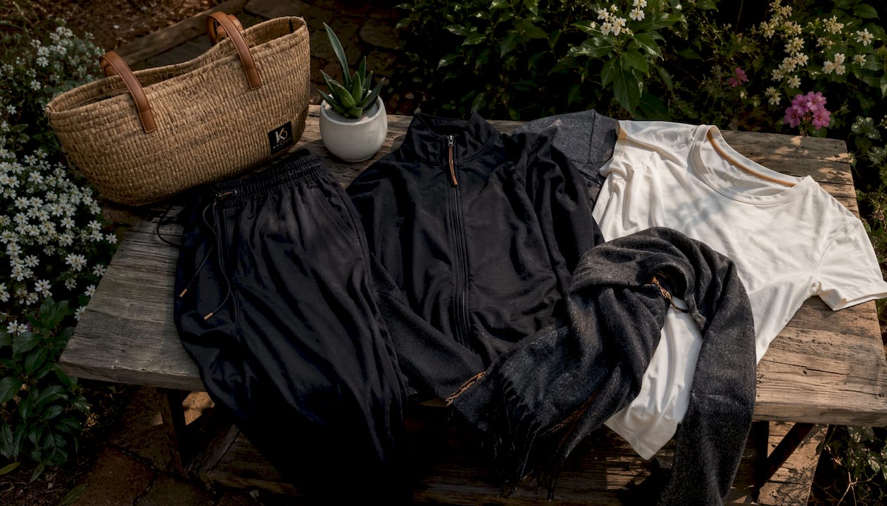 Assorted folded recovery apparel on display table