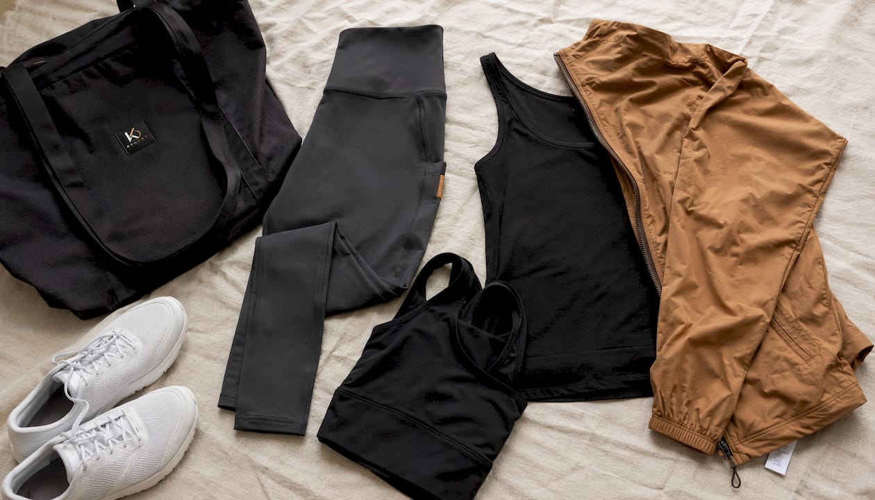 Flat lay of minimalist athletic outfit pieces