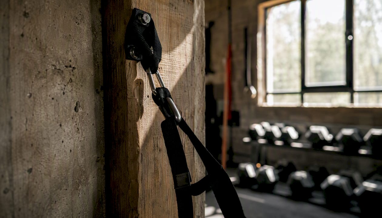 Suspension trainer anchored to beam