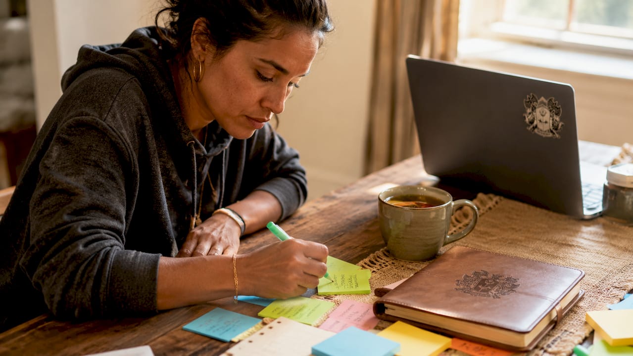 Hands marking planner illustrating personal integrity