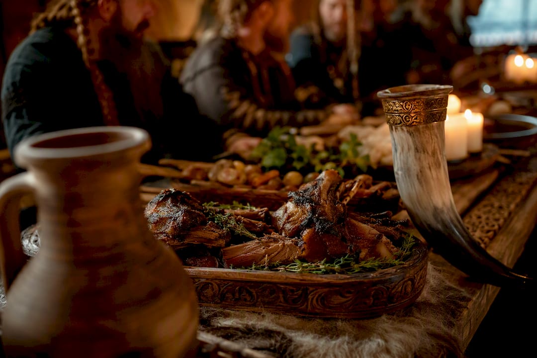 Norse feast with roasted boar and drinking horn