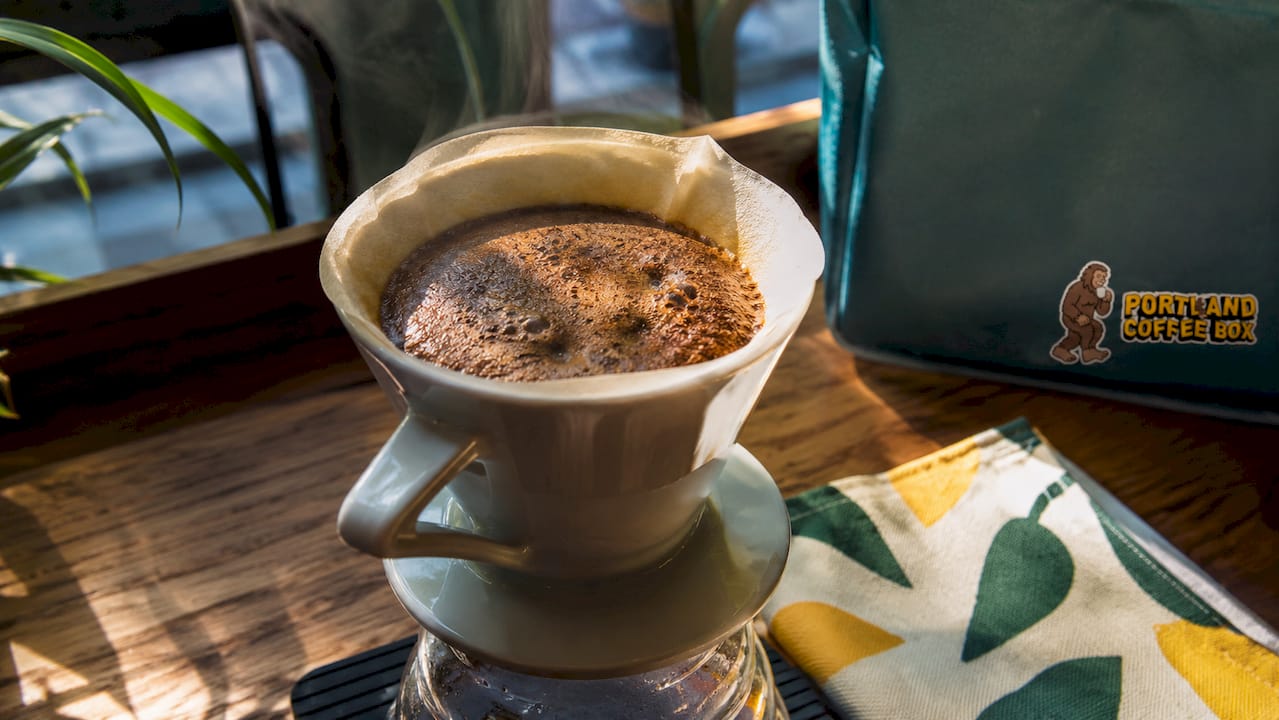 Close-up overhead view of coffee bloom bubbles
