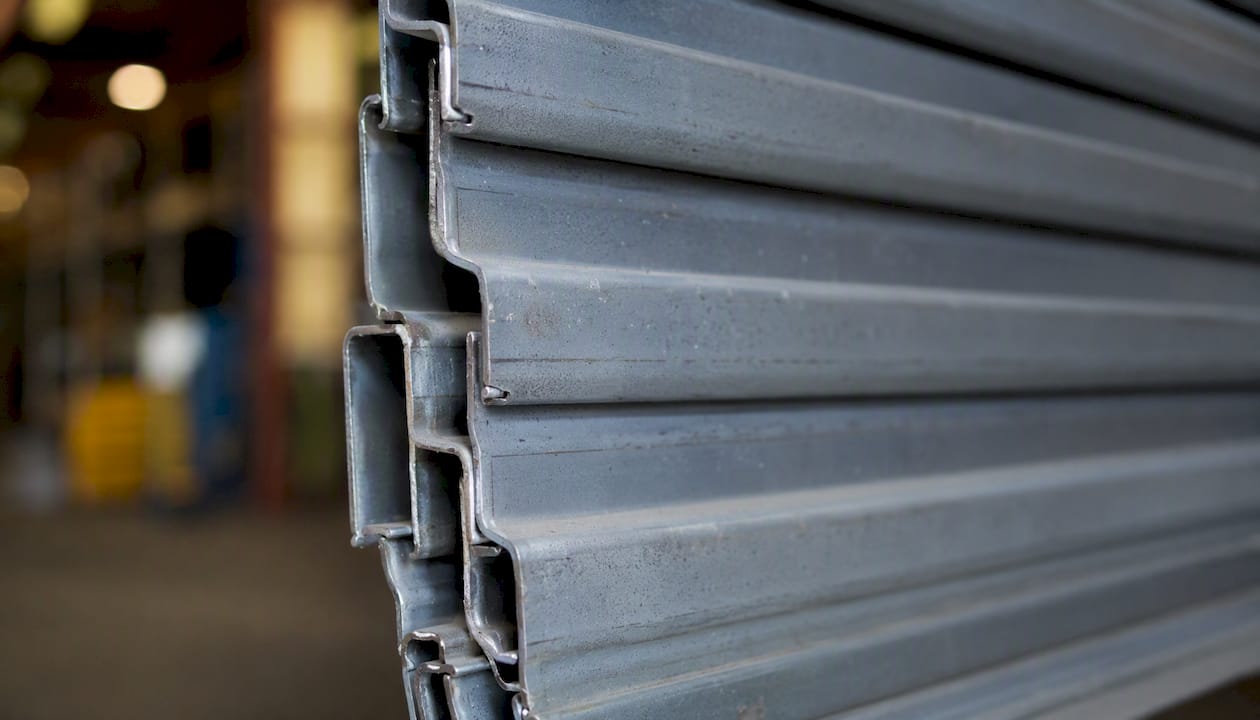 Close-up on interlocking steel slats and locks