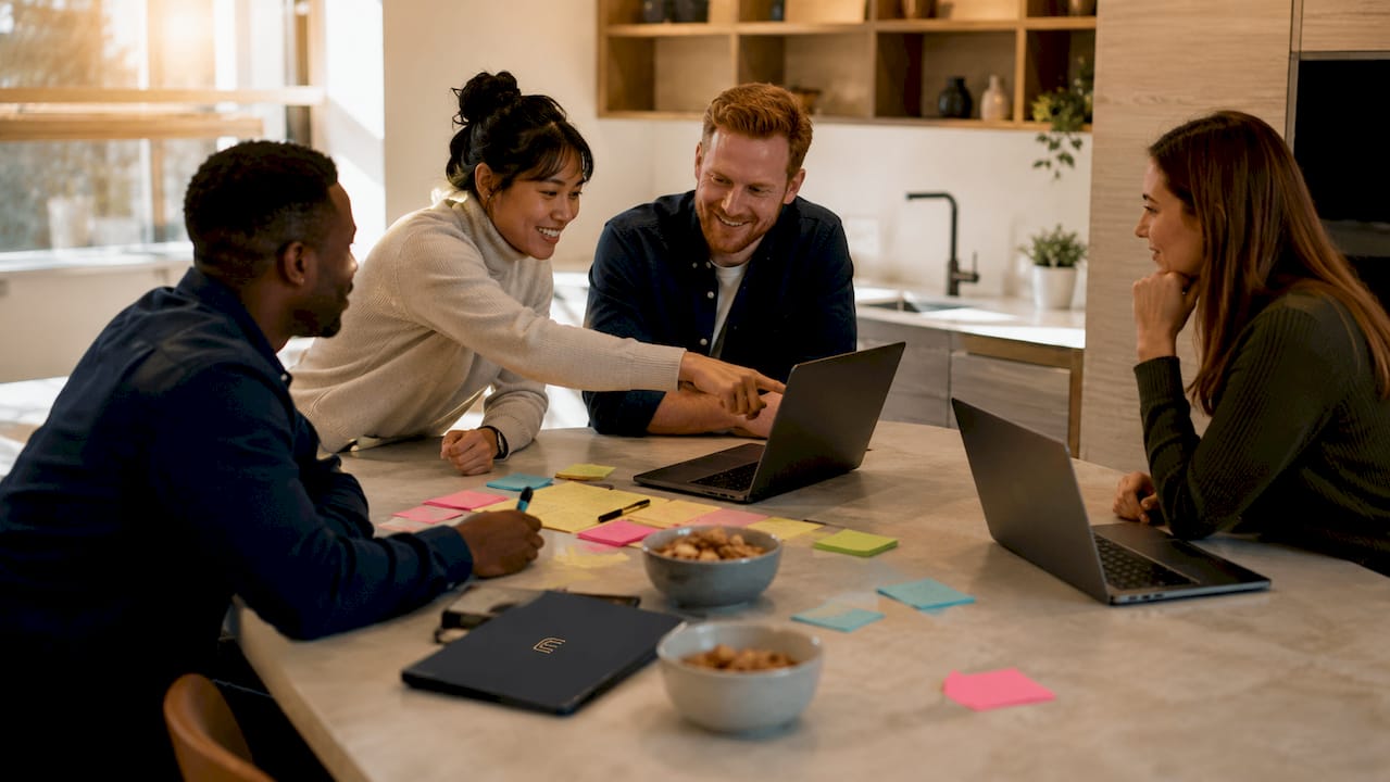 Team collaborating around customer success workflows