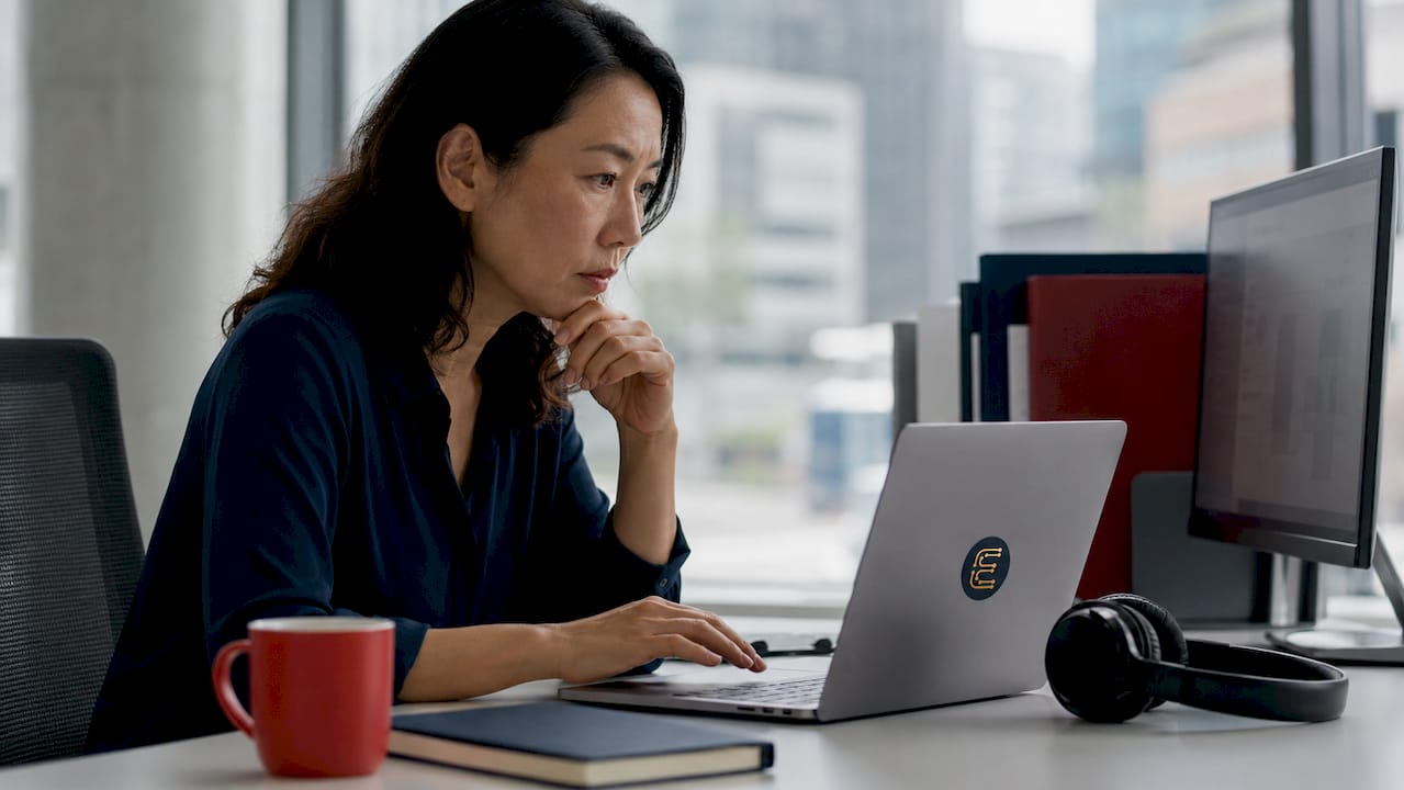 Data analyst reviewing customer journey data