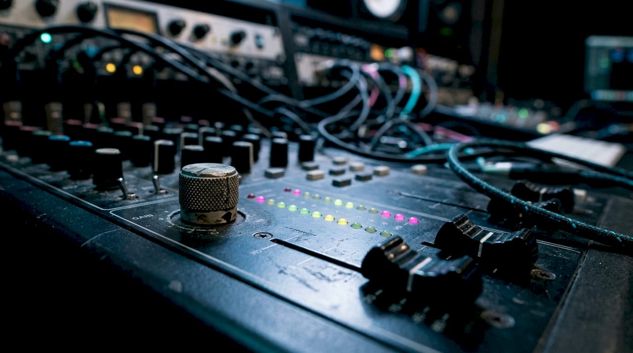 Close-up of mixing desk channel strip controls
