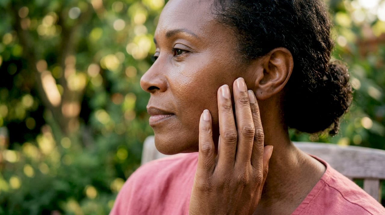 Close-up side profile of hydrated smooth skin