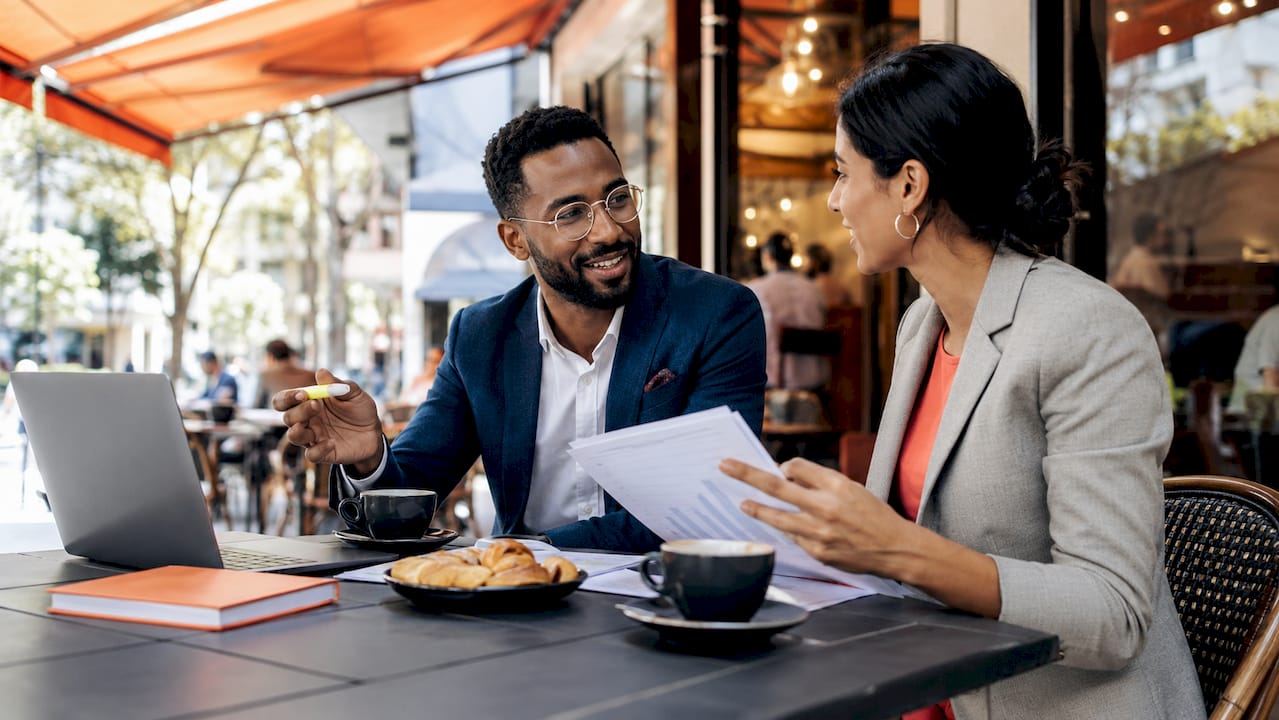Two consultants discussing recruitment business development
