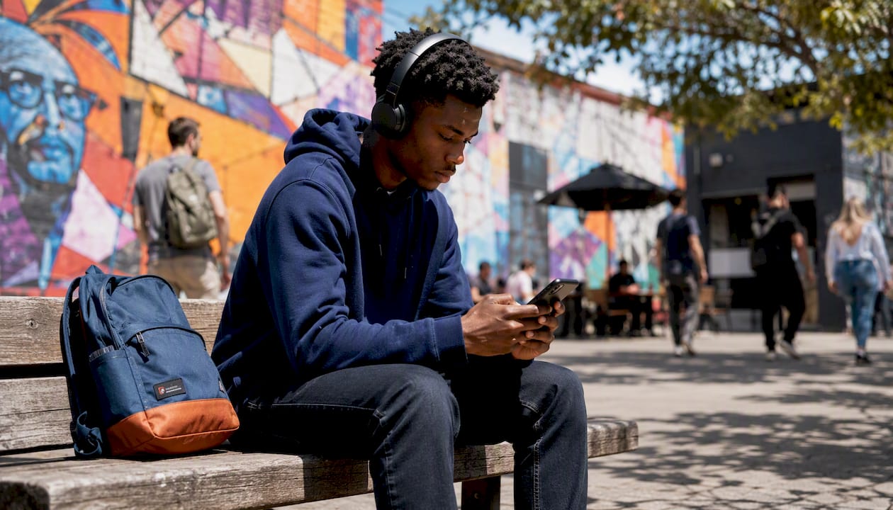 Job seeker checking employer reviews outdoors