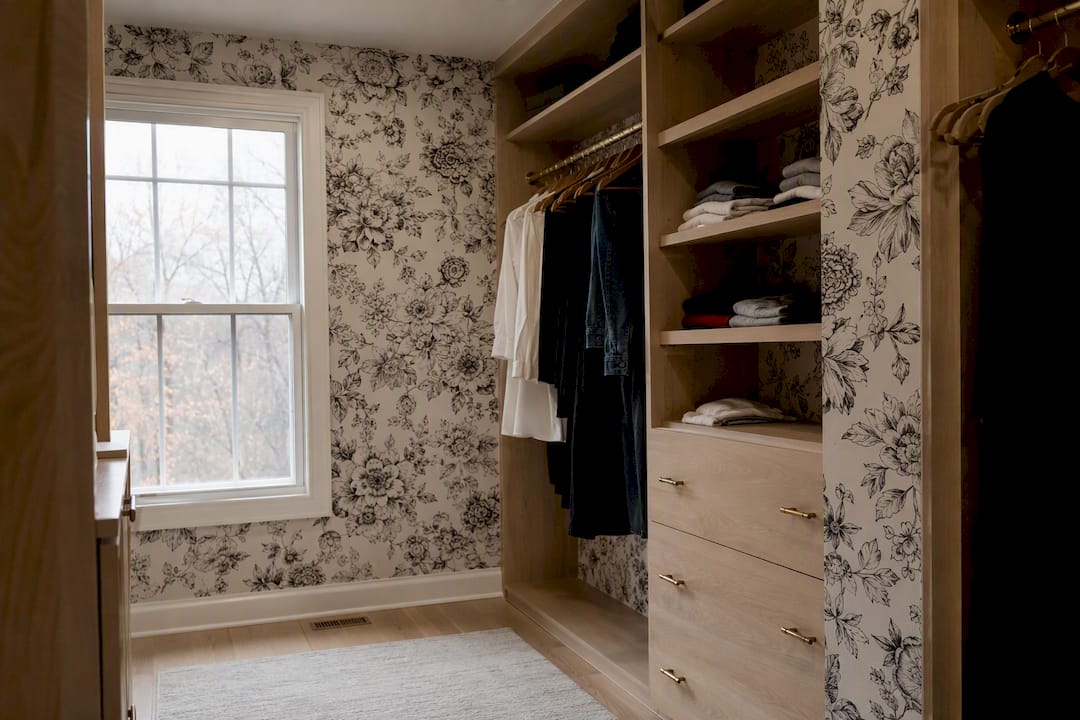 Black and white floral wallpaper in teen closet