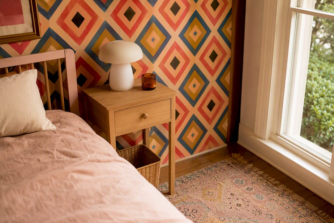Retro geometric wallpaper in teen bedroom