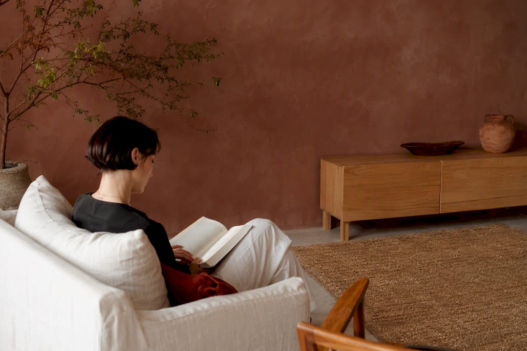 Natural materials complementing limewash wallpaper