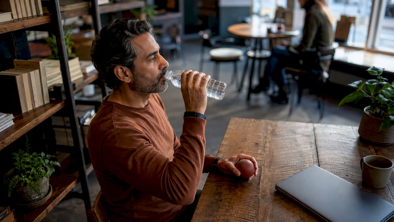 Man managing cravings in counseling room