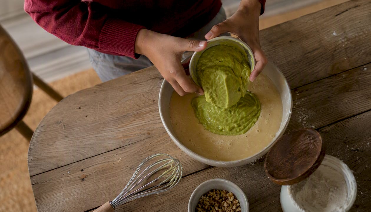 Child mixing prebiotic snack batter