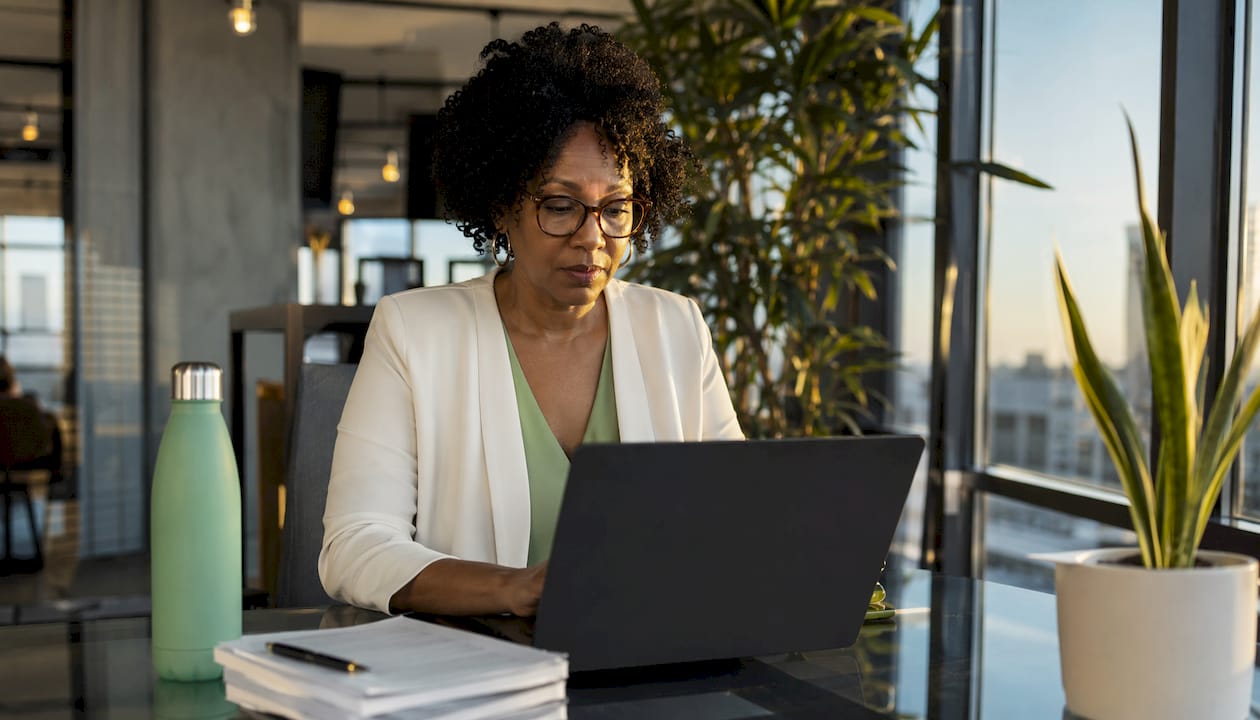 Cybersecurity analyst reviewing web security reports