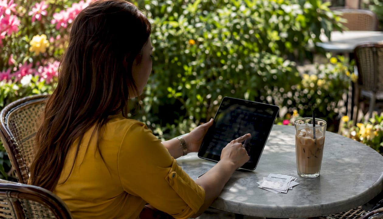 Woman interacting with football betting app