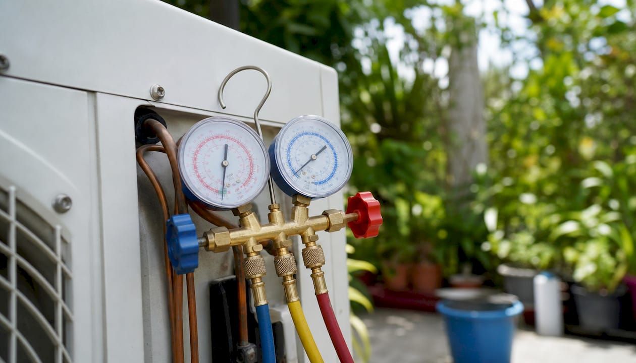 the role of refrigerant in hvac systems explained 2 close-up of refrigerant gauges and hvac valves