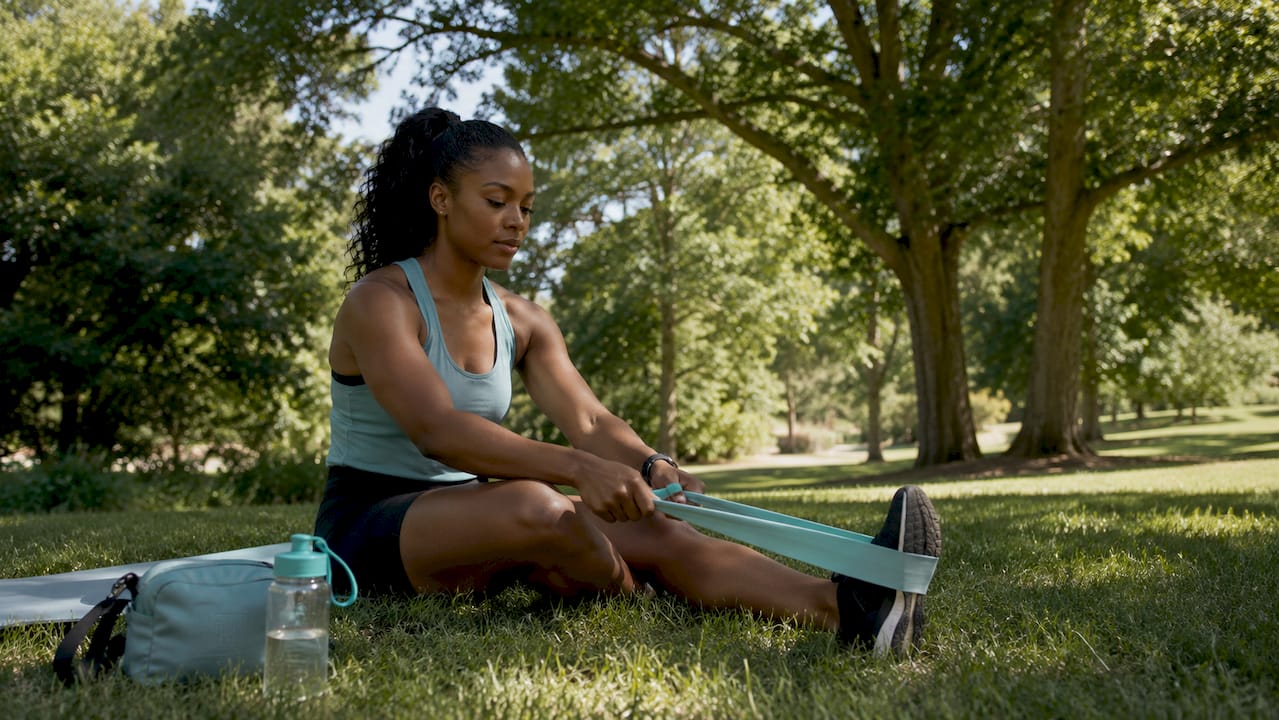 Female athlete stretching after gym workout
