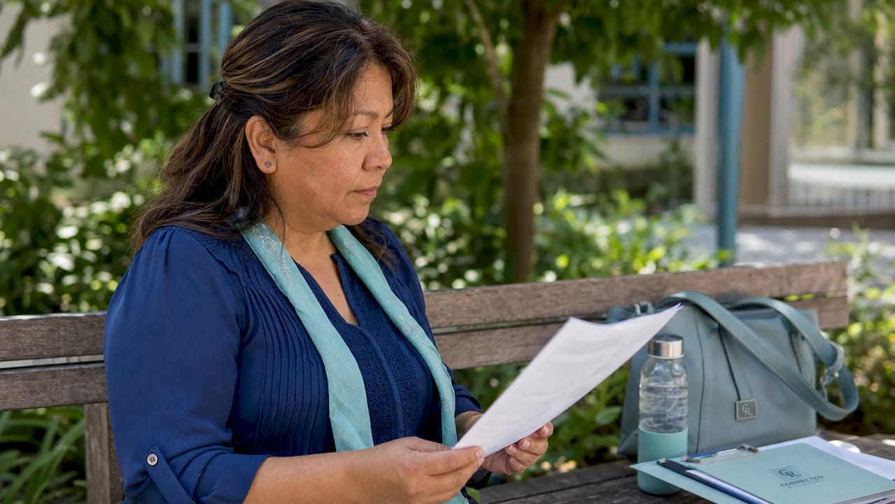 Patient reading privacy notice in rehab center