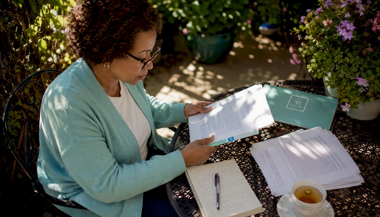 Woman reviewing substance use privacy documents at home