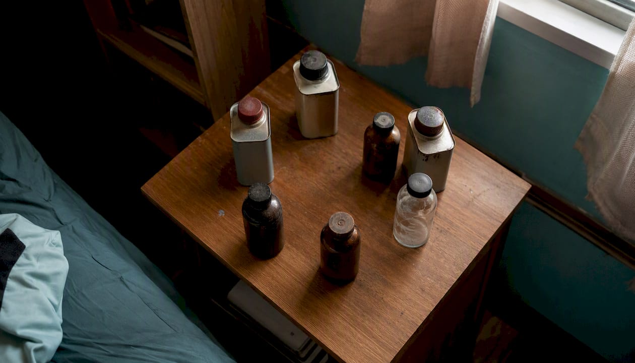 Solvent bottles associated with inhalants on table
