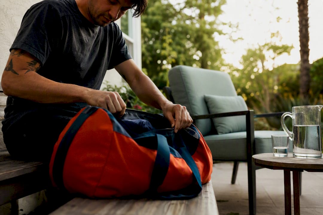 Patient preparing belongings in rehab room