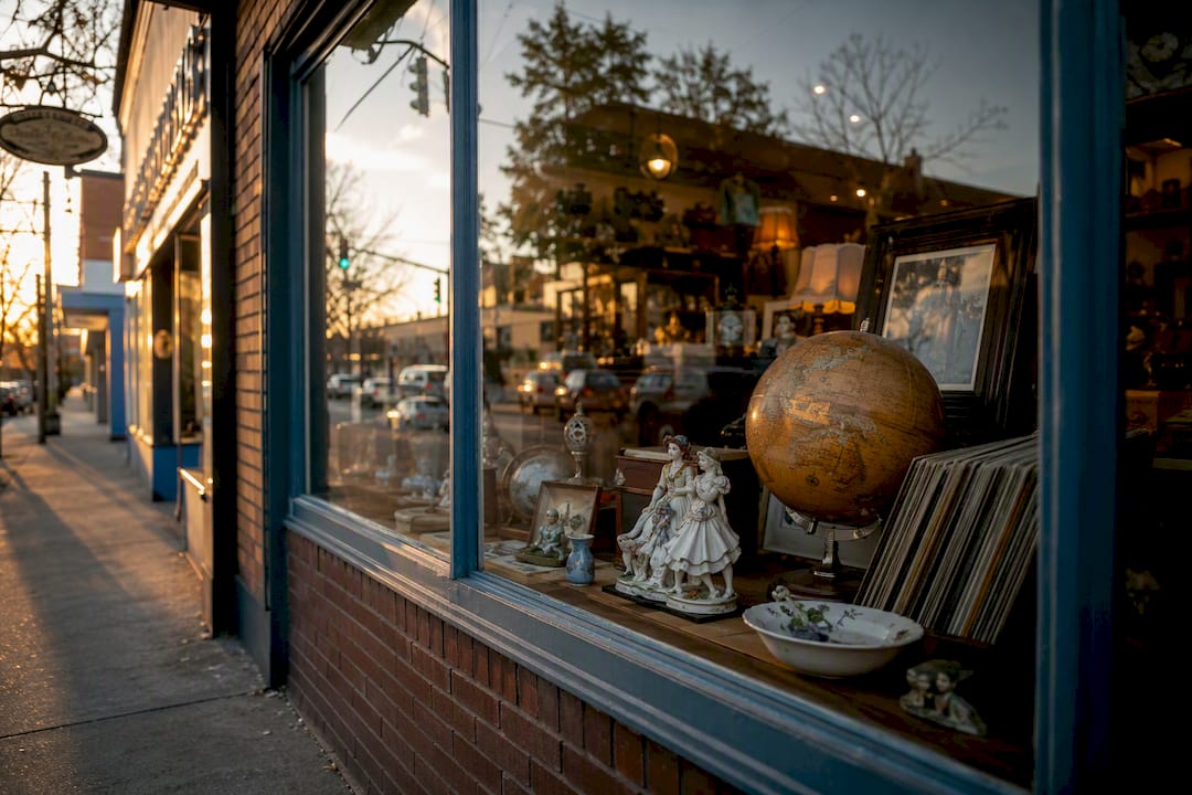 Antique store window with vintage items