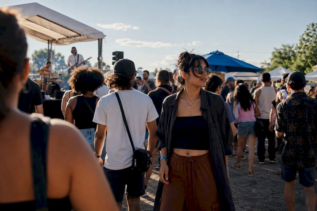 Crowd moving between Denver music festival stages