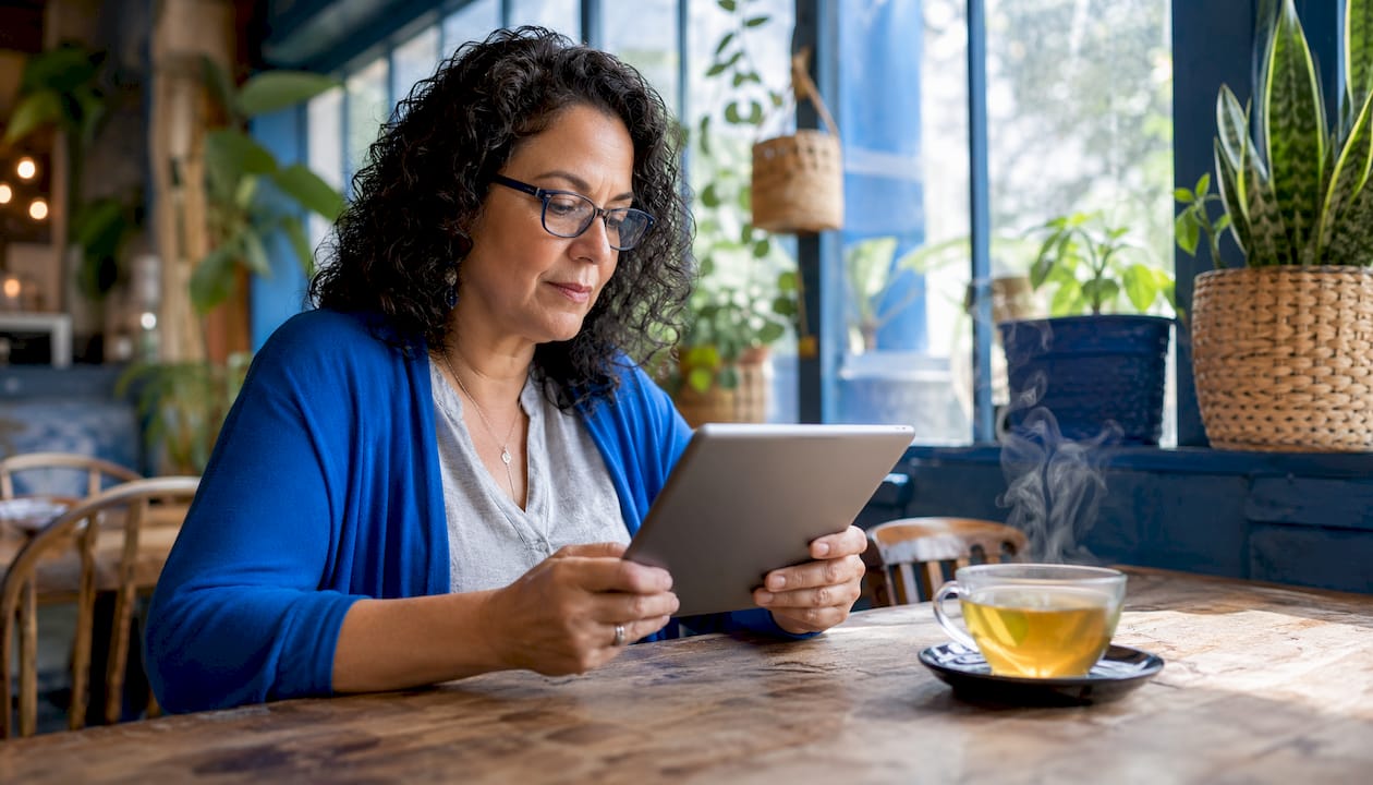 Woman reading tablet with clear typography