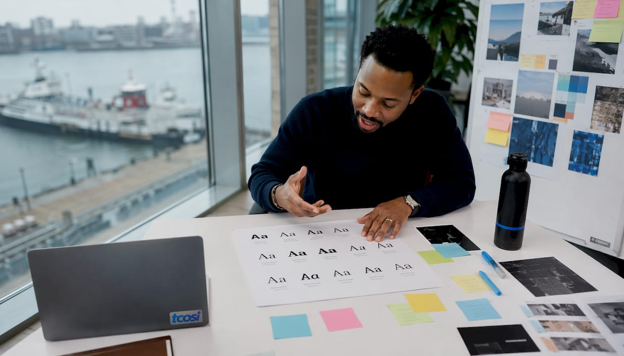 Designer reviewing typography brand style guide