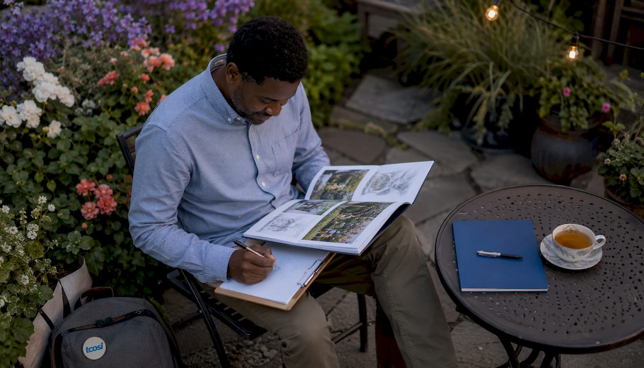 Business owner browsing design inspiration materials