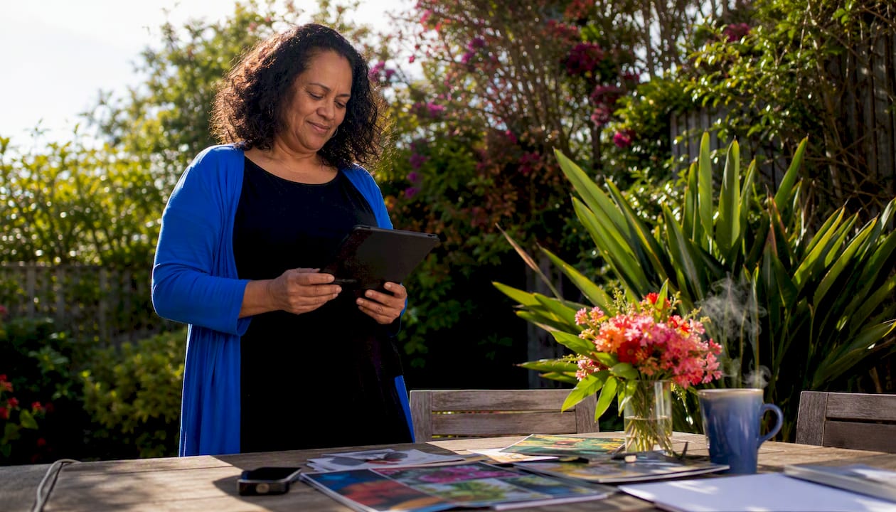 Female business owner reviewing marketing tech options
