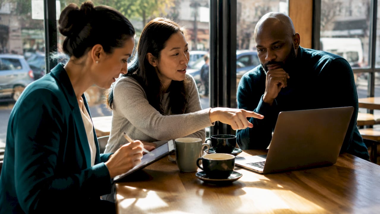 Team discussing salary growth in meeting room