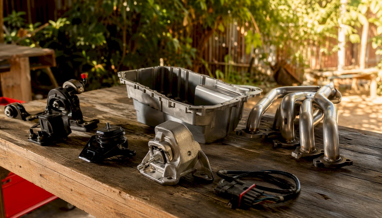 Close-up of LS engine swap parts on workbench