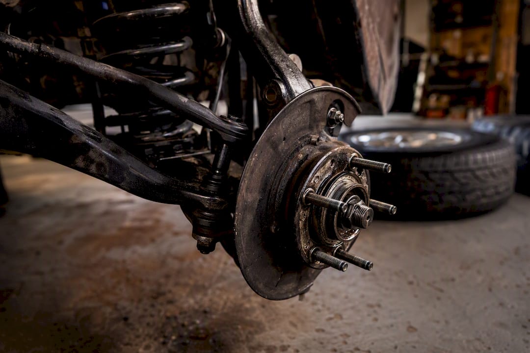 Wheel bearing and hub with offset load focus