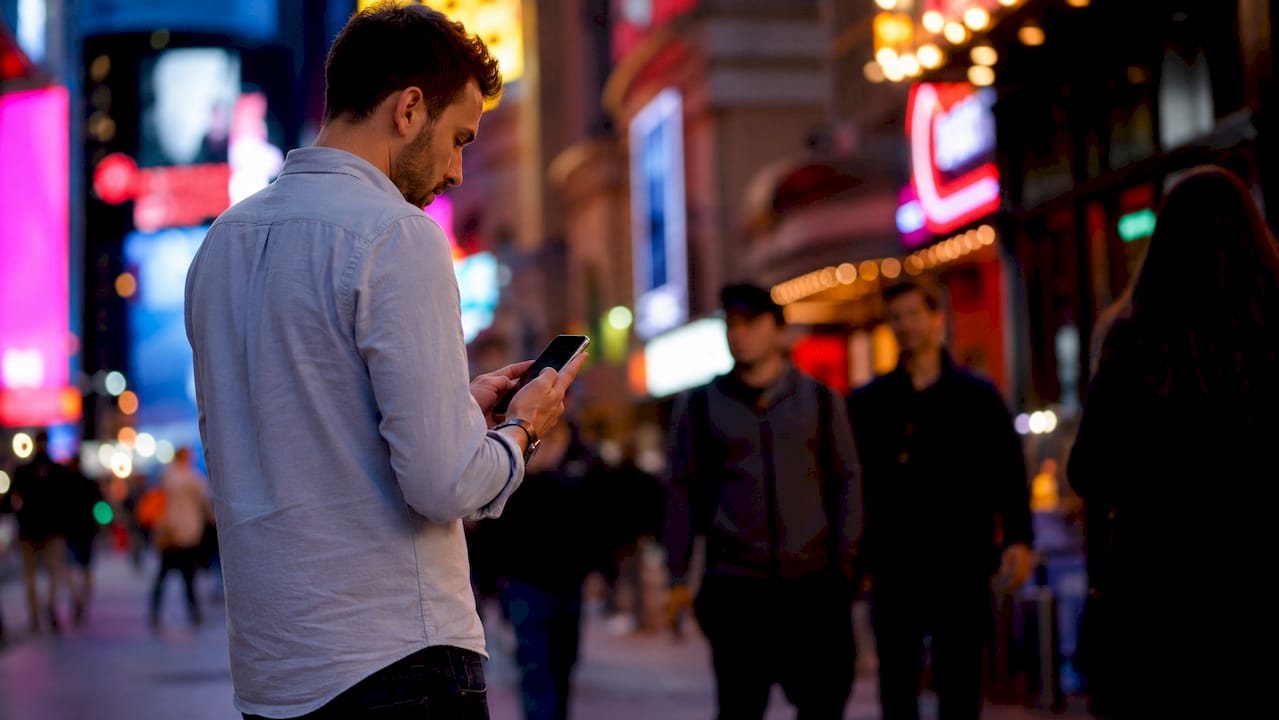 Music fan using phone app filtering concerts