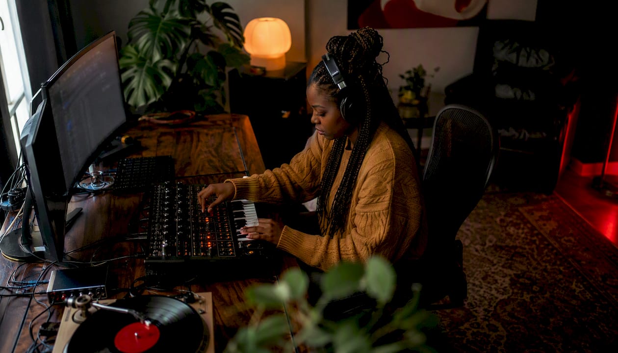 Producer working in home R&B studio