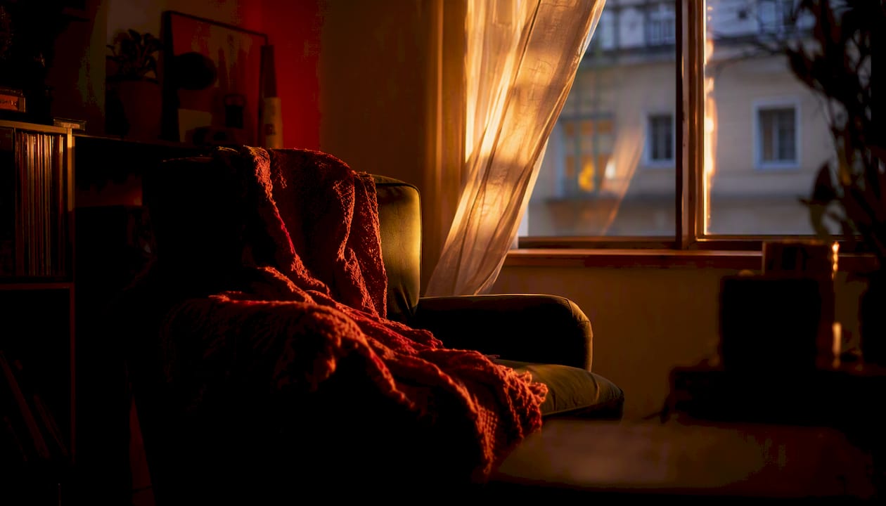 Jacket on chair in shadowed room