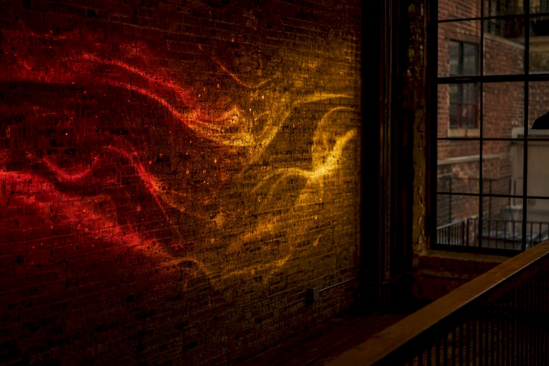 Abstract pulsating music visualizer projection on wall