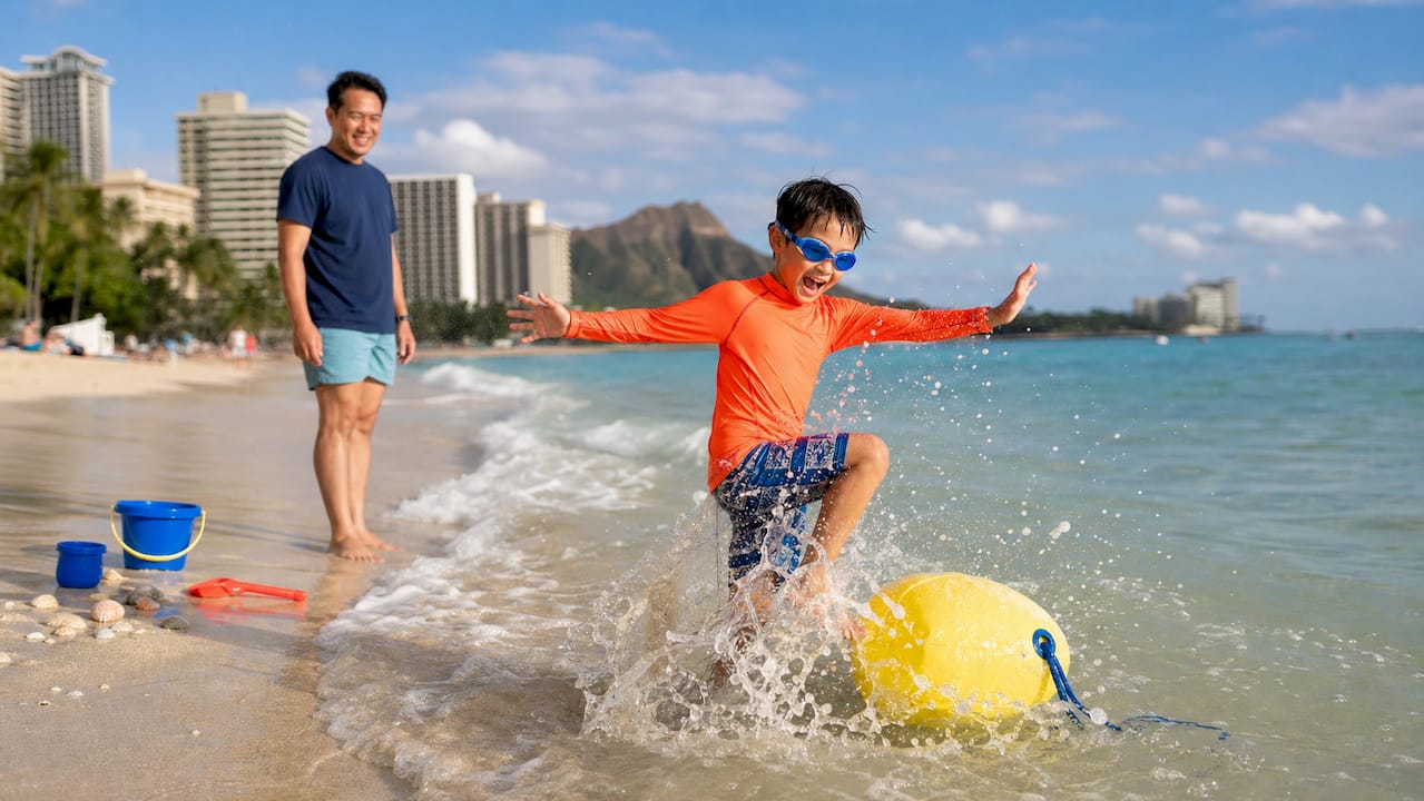 Child playing confidently in shallow ocean water