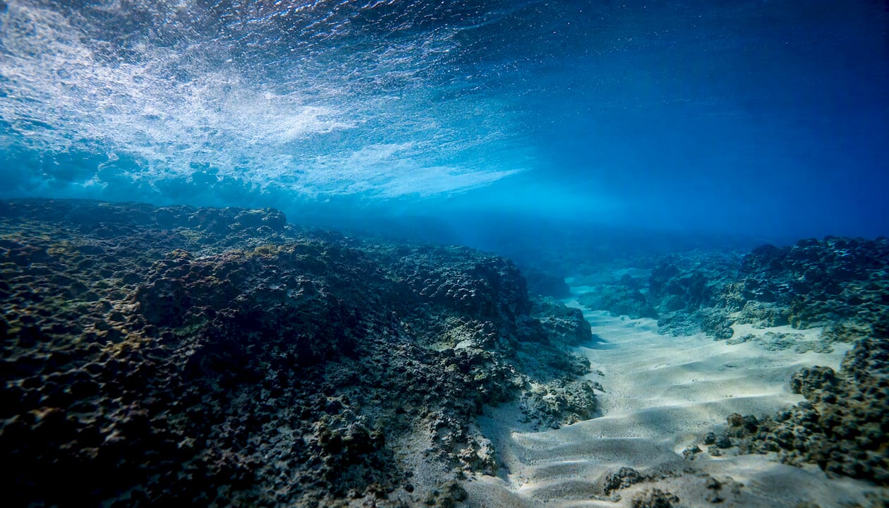 Underwater canyon funneling ocean swell energy