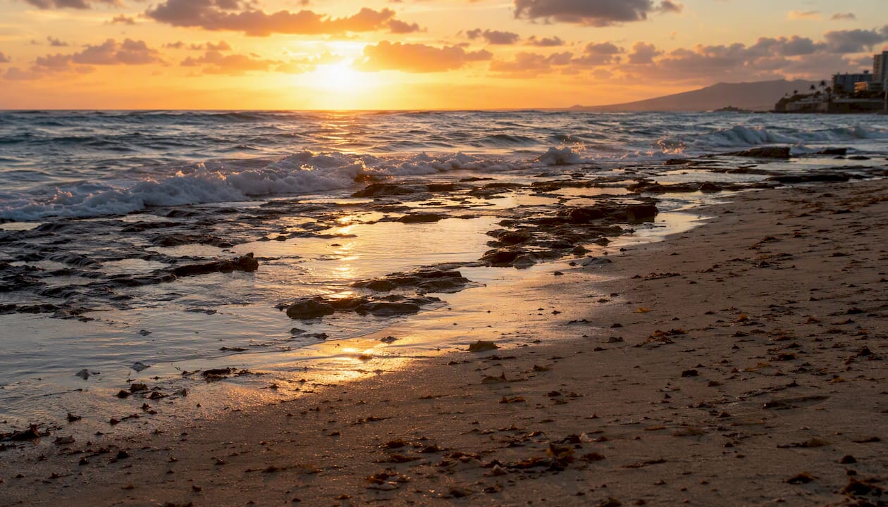 Waves breaking over reef at different tides