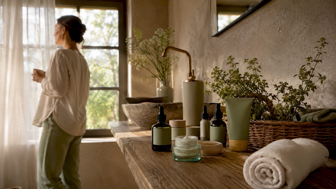 Eco-friendly skincare products on wooden vanity