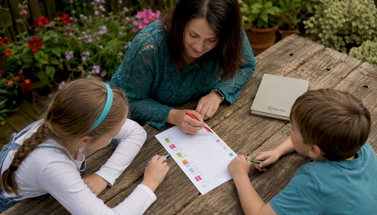 Family reviewing gift checklist at kitchen table