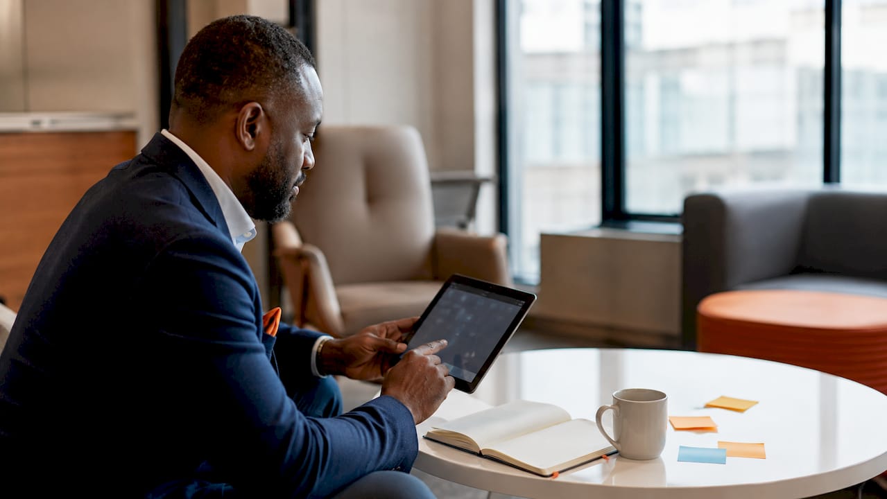 Hands using tablet for call center software