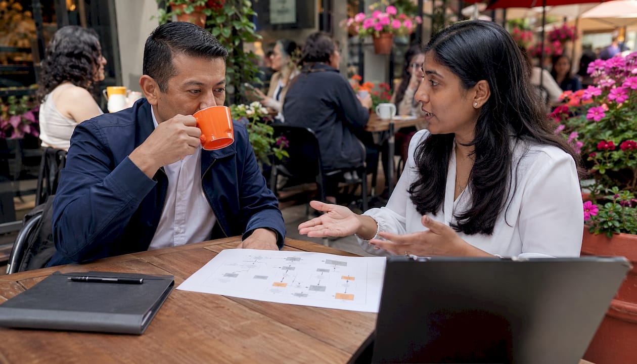 Two colleagues reviewing call screening options
