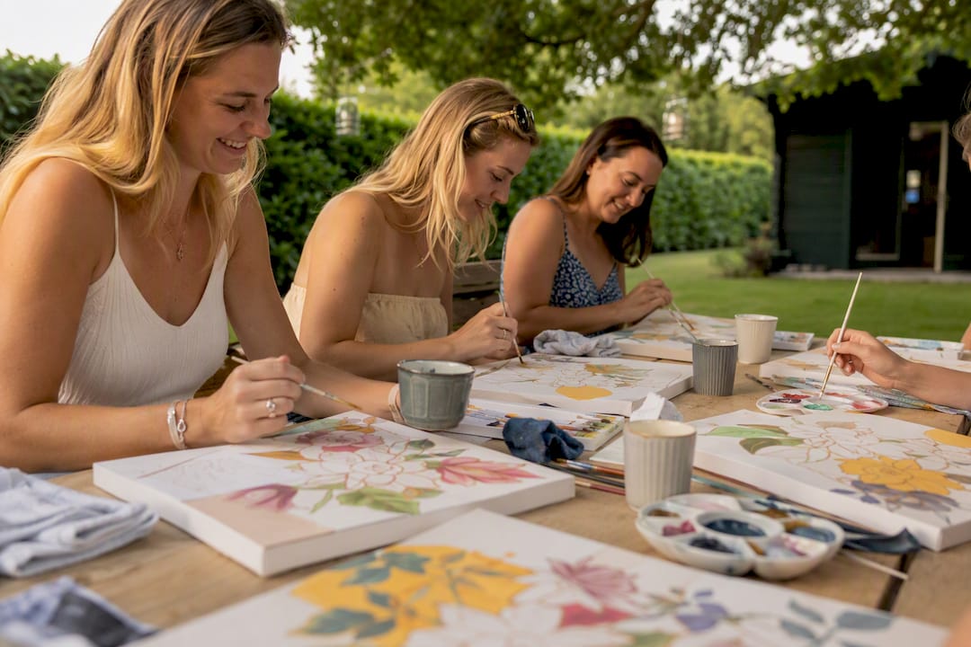 Women painting by numbers at hen party