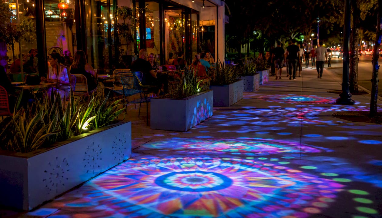 Brightly glowing UV-reactive public art at night