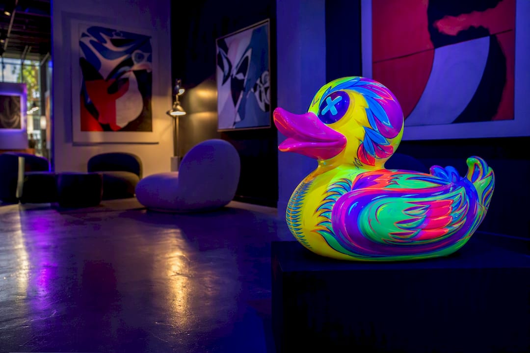UV-reactive pop art sculpture glowing in gallery